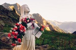 Votive Virgin Mary sculpture at Roccia dell'Apparizione (Rock of the Apparition) in the mountains of Vinadio: Piedmont, Italy; near the sanctuary of Sant'Anna