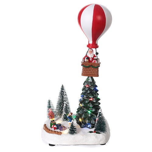 village-noel-neige-montgolfiere-mouvement-lumieres-led-30x15x10-cm